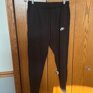 NIKE women’s fleece pants size large.